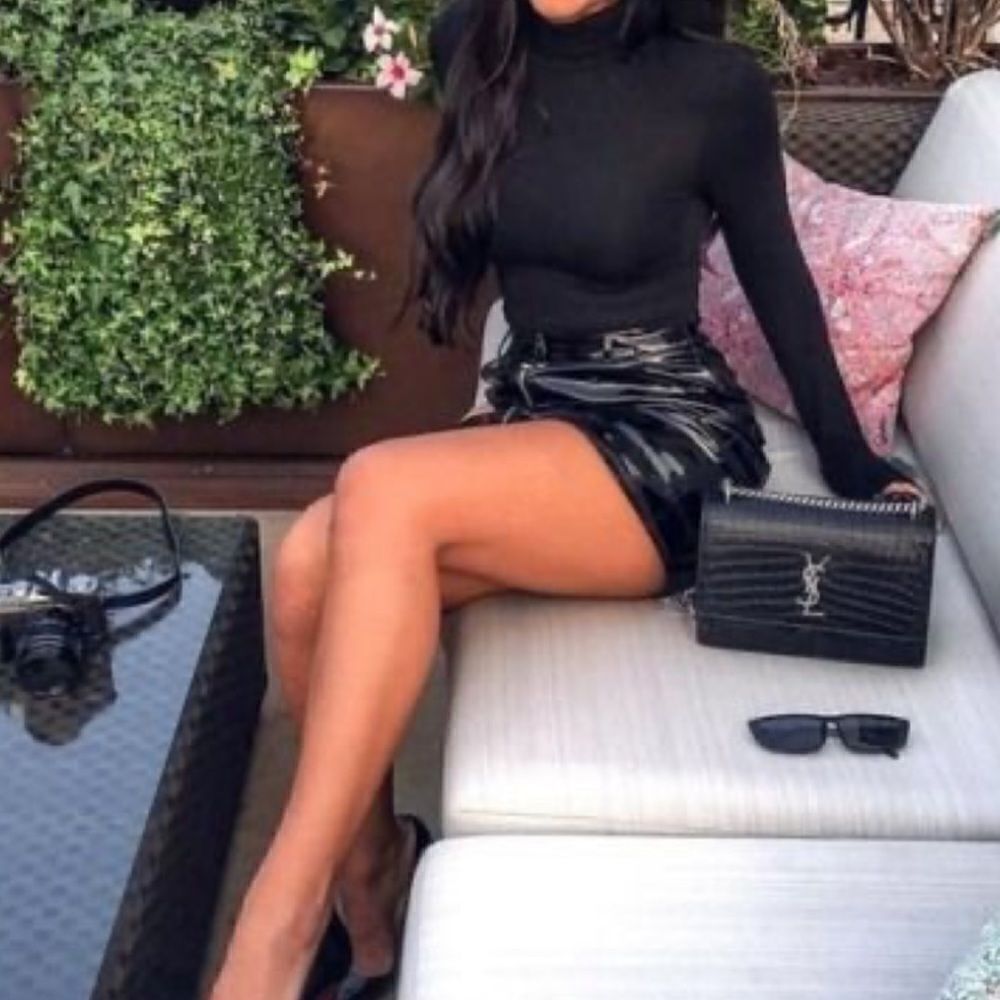 Black turtleneck bodysuit